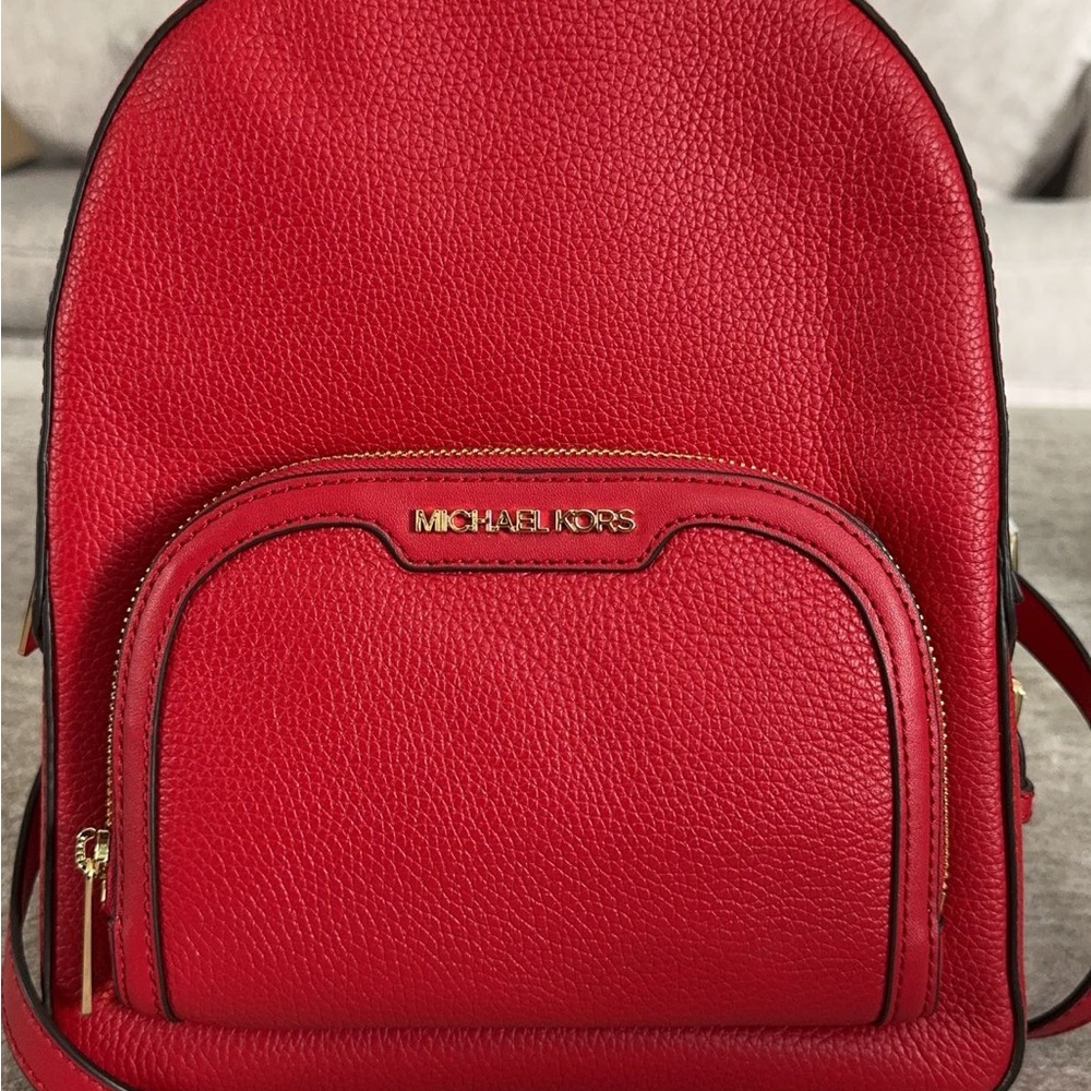 Michael Kors Cherry Red Backpack
New with tag